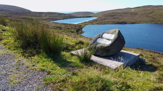 SIgn explaining that this is Lough Na Mine on Arranmore, County Donegal - Republic of Ireland