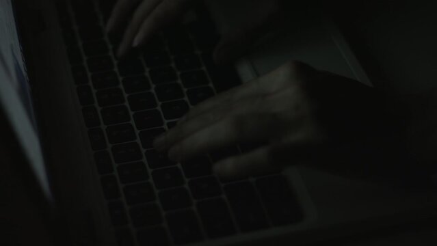 Young Woman's Hands Typing On Laptop Late at Night 4K