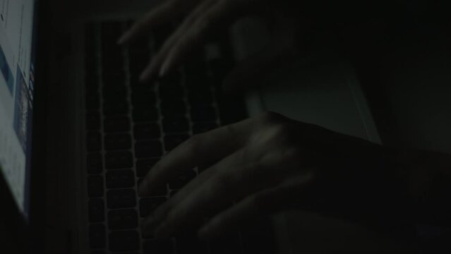 Young Woman's Hands Typing On Laptop Late at Night 4K