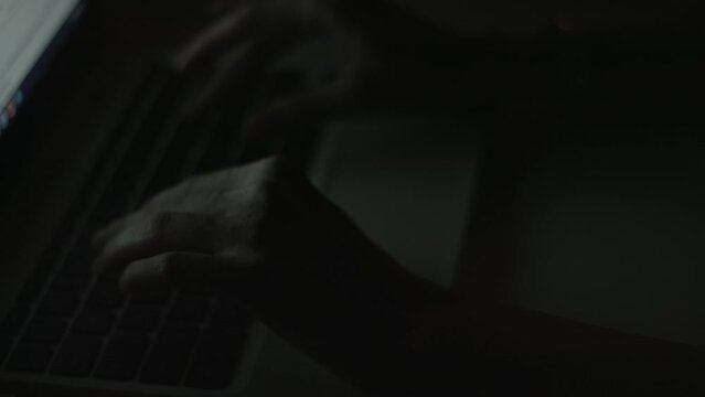 Young Woman's Hands Typing On Laptop Late at Night 4K