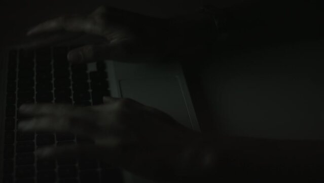 Young Woman's Hands Typing On Laptop Late at Night 4K