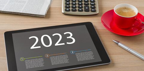  A  tablet with the headline 2023