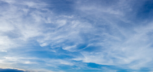 Fototapeta premium Beautiful sky with white clouds. Sunrise sky nature background with white clouds for design concept and isolated text material
