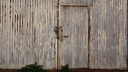 rusty and worn warehouse door