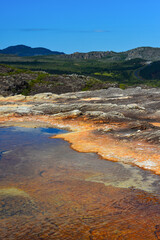 The shallow natural pools of the rocky Rio do Lajeado river surrounded by the rugged Serra do Espinhaço range, Milho Verde, Minas Gerais state, Brazil