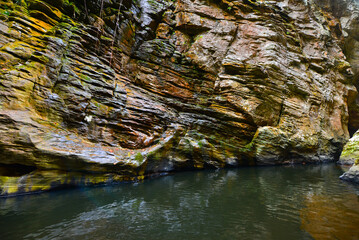 A detail of the yellow and green walls of the narrow, remote Cânion do Funil canyon, Presidente Kubitschek, Minas Gerais state, Brazil