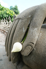 Ruins of pagodas, monks and walls that remain of Wat Yai Chaimongkol, Ayutthaya, Thailand, were...