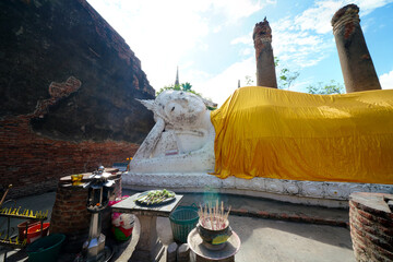 Ruins of pagodas, monks and walls that remain of Wat Yai Chaimongkol, Ayutthaya, Thailand, were...
