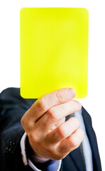 businessman showing a yellow card