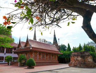 Ruins of pagodas, monks and walls that remain of Wat Yai Chaimongkol, Ayutthaya, Thailand, were...