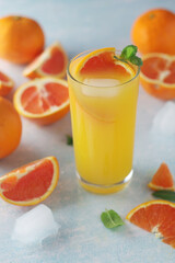 Red oranges juice with mint and ice
