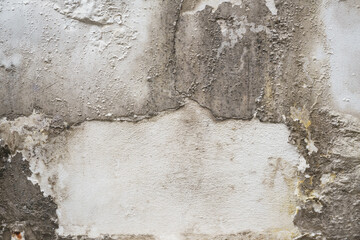 Problem of acrylic white color painting crack abstract surface texture on exterior concrete wall background by humidity.for repair old construction. or vintage renovation home.