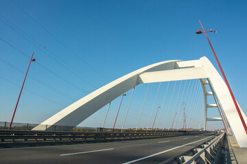 The Pentele Bridge or M8 Danube Bridge spanning river Danube between Dunavecse and Dunaujvaros in Hungary - obrazy, fototapety, plakaty