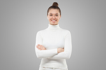 Female in white clothes with hair bun, smiling happily, feeling confident in professional sphere