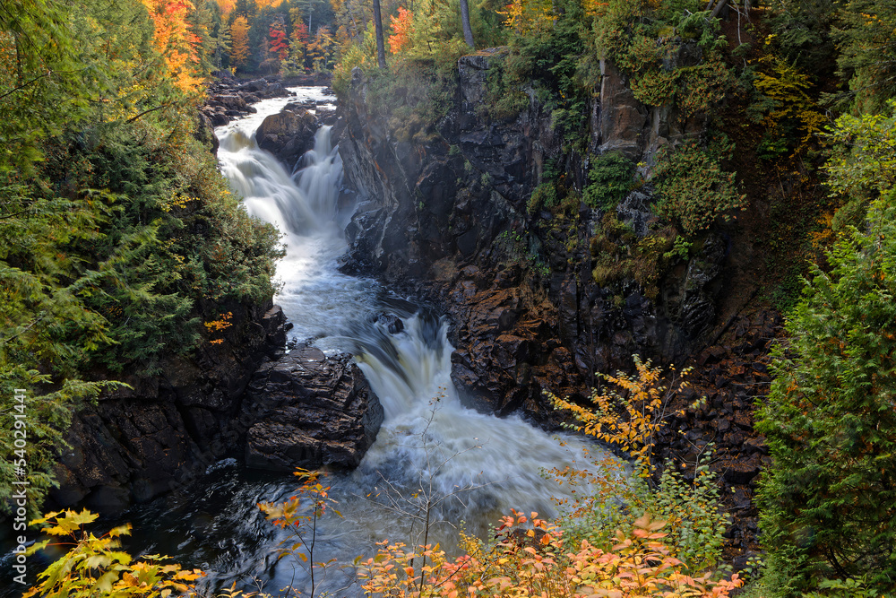 Wall mural Waterfalls of Parc des Chutes-Dorwin (English : Park of Dorwin Falls), a touristic site, on the Ouareau River, in Lanaudiere, Quebec