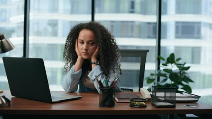 Woman feeling professional crisis sitting office desk close up. Girl overworking