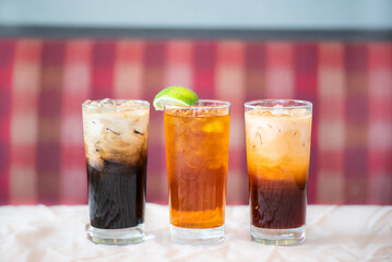 Assorted Thai iced teas on table top