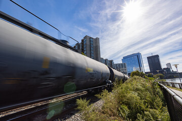 Fototapeta premium Train entering a city