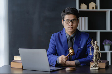 legal advisor concept Asian male lawyer working in office
Fairness Attorneys provide legal advice...