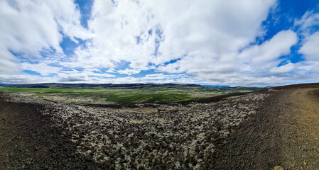 Unreal volcanic landscape in Iceland with steaming rocks on the Grabok volcano.