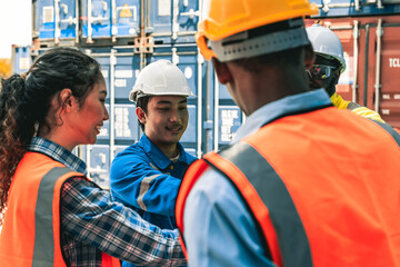 Container worker discussing their daily task together before they start their daily task.