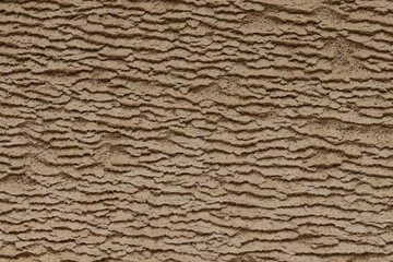 Background, texture of low-quality foam concrete after active exposure to water and wind
