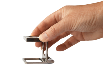 Gesture series: hand holding a thread counter.