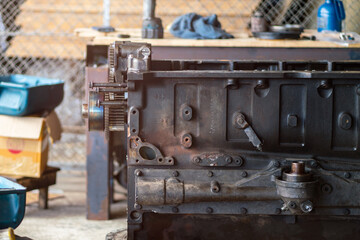Plakat closedup of engine oil pump in workshop