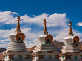 Buddhist Stupa with beautiful mountain range of Ladakh - obrazy, fototapety, plakaty
