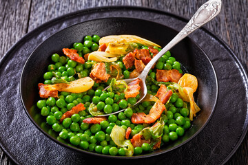 petits pois, french dish of garden green peas