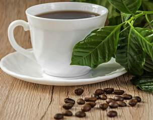 coffee, kawa w białej filiżance, coffee in a white cup and brown coffee beans on the table....