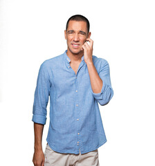 Concerned young man making a scratching gesture