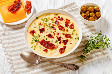 Beer cheese soup in bowl, top view