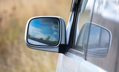 Mirror on the car door.