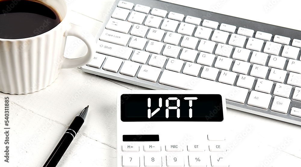Poster vat text on calculator with keyboard and coffee