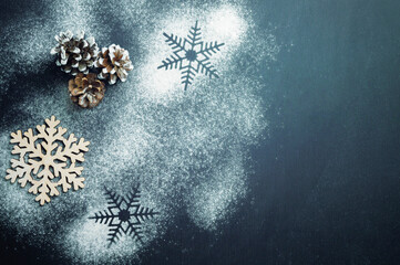 Baking background with copy space on dark surface for text. Top view. kitchen utensils and flour on...