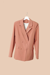 Studio shot of floating double breasted blazer on coat hanger