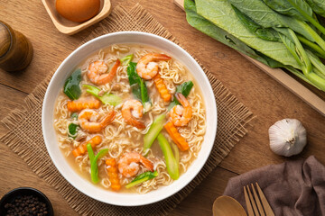 Fried Instant Noodles with Shrimp and kale carrot in Gravy Sauce (rad na goong).Thai food.Top view