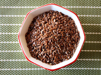 Flax, also known as common flax or linseed, is a flowering plant, Linum usitatissimum, in the...