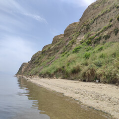 sea and sky and mountains shore