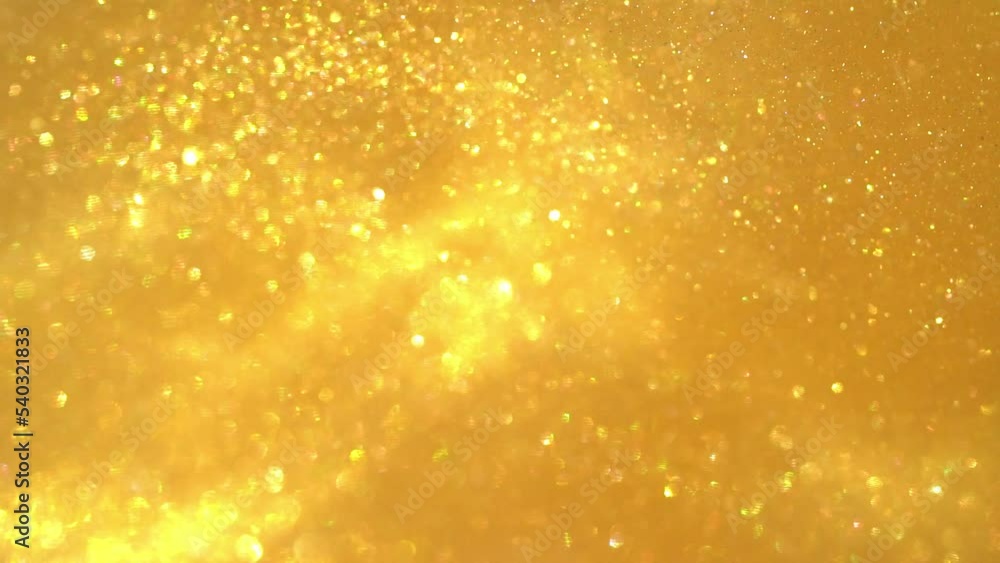 Wall mural wave and spiral motion of floating gold particles. abstract gold luxury background. chaotically movi