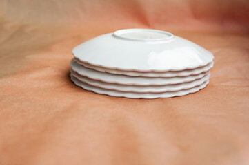 Fototapeta na wymiar stack of snow-white porcelain plates. copy space