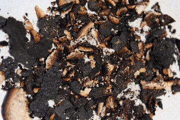 a handful of burnt cookie crusts on the table. top view