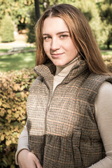 Portrait of girl around fall leaves 