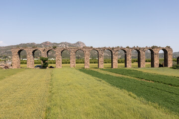 Fototapeta na wymiar Aerial view of Aspendos aqueduct stone structure
