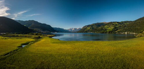 The panorama with Kitzsteinhorn(Tauern Alps) and Zell am See in the Zell am See-Kaprun region,...
