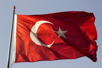 Turkish flag on blue sky - obrazy, fototapety, plakaty