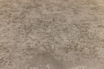 Fototapeta na wymiar Blurred defocused background of textured wallcovering surface