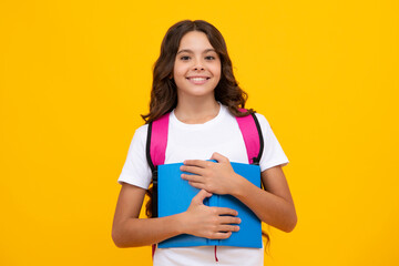 School teenager child girl 12, 13, 14 years old with school bag book and copybook. Teenager schoolgirl student, isolated background. Learning and knowledge.