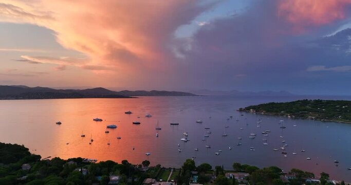 Aerial view of Saint-Tropez during sunset. St. Drone flies over the harbor of France Mediterranean Azur.